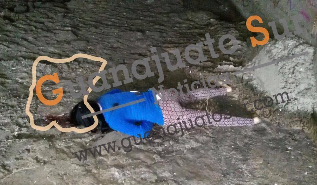 La mujer presentaba al menos un impacto de arma de fuego en la cabeza y otro en el tórax.